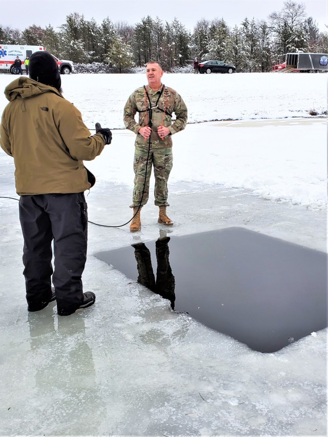 Fort McCoy Garrison Commander Col. Michael D. Poss prepares to participate in a cold-water immersion familiarization event Jan. 15, 2021, at Fort McCoy, Wis. Poss was learning about this training event that is part of the Fort McCoy Cold-Weather...