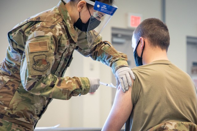 Massachusetts military forces join to administer vaccine
