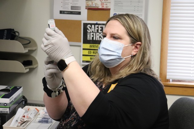 Erica Miller, a registered nurse with the Fort McCoy Health Clinic, prepares a COVID-19 vaccination Jan. 26, 2021, during the first round of COVID-19 vaccinations at Fort McCoy, Wis. Several people received the vaccine at the post Jan. 26. The...