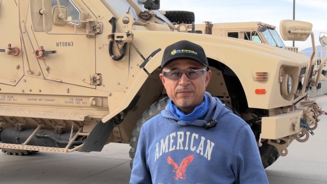 Francisco Lopez, storage services team leader at Fort Hunter Liggett's ECS 170, stood in front of a M-ATV mine-resistant vehicle which had just been serviced. Equipment may have been damaged during use and a full inspection is done to know what work orders to send out. “Basically, the Soldiers take fairly good care of the equipment,” he said, adding, “We try to perform our best for the United States military.”