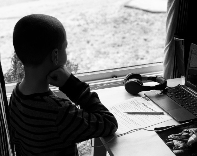 The author’s 11-year-old son takes a break from the tedious tasks virtual schooling have imposed on him to think about what he could be doing if he were in the classroom with his friends.