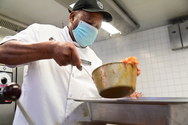 Haze Hardy Jr. prepares Jambalaya for "Soul Food" day at the Original's Dining Facility on Panzer Kaserne.