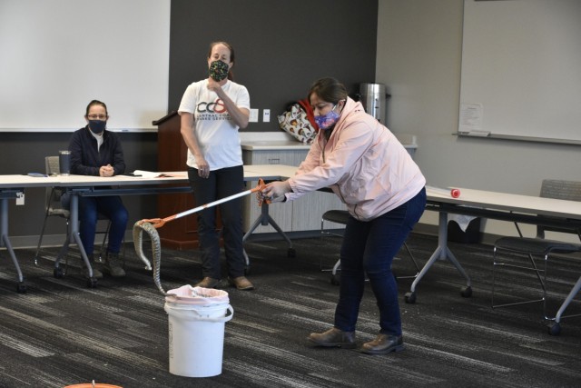 A class in handling, relocating, and understanding rattlesnakes was given in the Directorate of Emergency Services classroom on Fort Hunter Liggett, California, Feb. 8, 2021. Dr. Emily Taylor, professor of herpetology and biological sciences at...