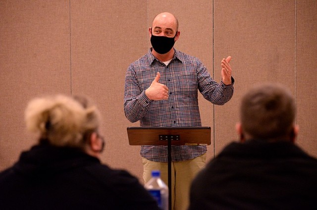Chaplain (Maj.) Jeff Smith, Command and General Staff College chaplain, leads couples in the "Vertical Marriage: The One Secret That Will Change Your Marriage" small-group study Feb. 12 at Frontier Chapel. Three couples met in person and several...
