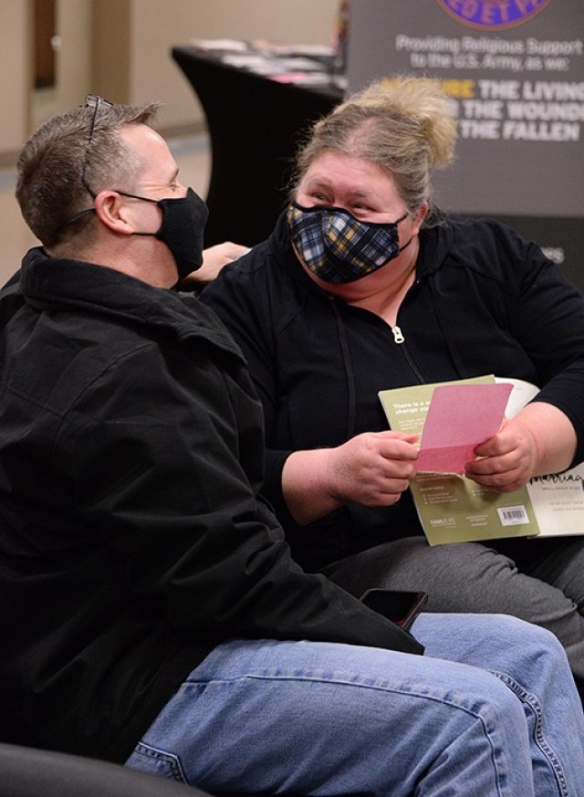 Maj. Dan Ables, Command and General Staff Officer Course student, and his wife Tonya Ables share with each other the numbers on a 1-10 scale that they rated their marriage during couple connection time of the "Vertical Marriage: The One Secret...