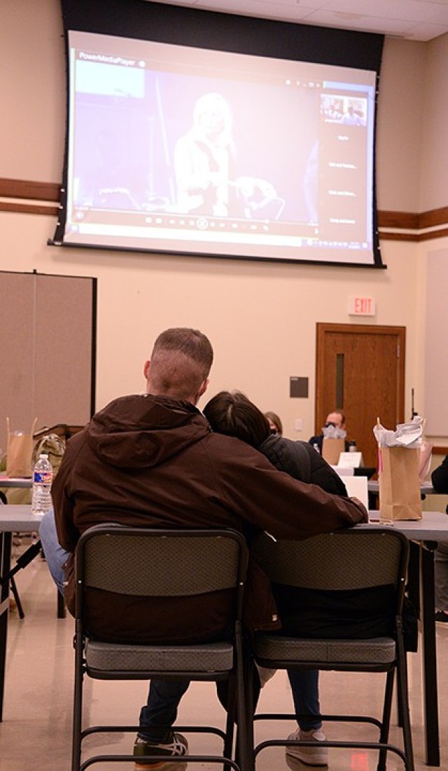 Capt. Stephen Nitkowski, Command and General Staff Officer Course student, and his wife Emika Okada watch a video segment of "Vertical Marriage: The One Secret That Will Change Your Marriage" small-group study Feb. 12 at Frontier Chapel. Three...