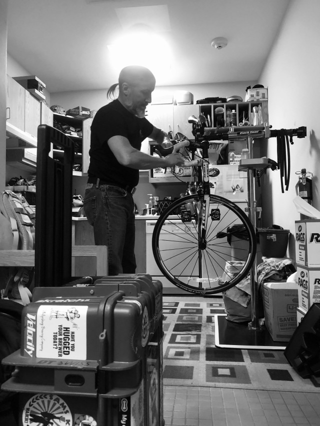 Retired Crew Chief and Team Army Mechanic John Koenck works on a bike at the Fort Bragg SRU in North Carolina. (Photo by Lee Whitford)