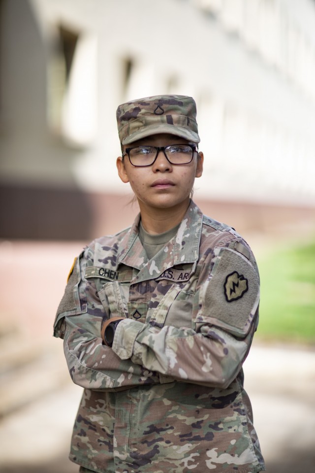 Pfc. Tricia Chen, a chemical, biological, radiological, and nuclear specialist assigned to the 29th Brigade Engineer Battalion, 3rd Infantry Brigade Combat Team, 25th Infantry Division poses for a photo outside D-Quad at Schofield Barracks, Hawaii on Feb. 17, 2020. (U.S. Army photo by 1st Lt. Angelo Mejia)