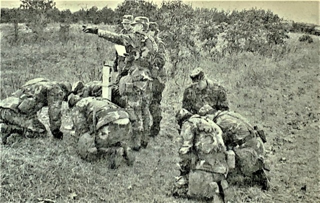 Soldiers with the 890th Transportation Company, an Army Reserve unit based in Green Bay, Wis., complete land-navigation training Oct. 28, 1990, at Fort McCoy, Wis. The company was doing the training as part of mobilization training to deploy to...