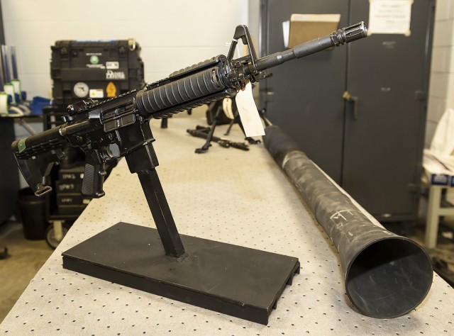  M4A1 5.56 carbine rifle is displayed in Anniston Army Depot&#39;s  Small Arms Repair Facility.  Small Arms Readiness Evaluation Teams, or SARET,  inspects and repairs small arms weapons on-site and during temporary duty travel missions. 