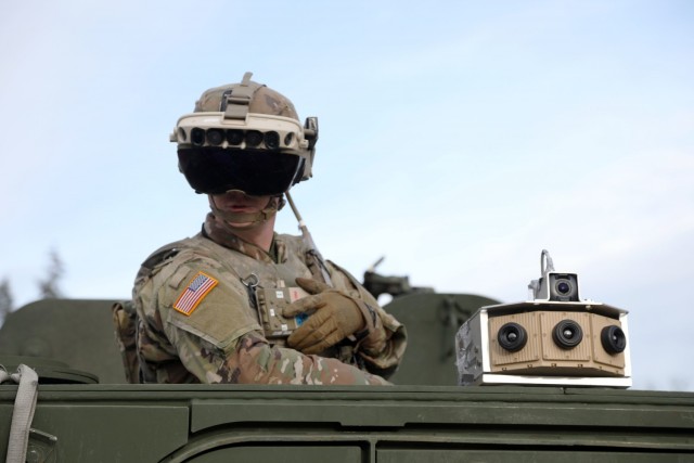 Soldier dons the Integrated Visual Augmentation System Capability Set 3 hardware while mounted on a Stryker in Joint Base Lewis-McCord, WA.