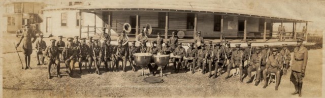 
FORT BENNING, Ga. – The all-African American 24th Infantry Regiment Band poses for a photo at Fort Benning in December 1930. At far right is its bandmaster, Warrant Officer Robert B. Tresville Sr. In observance of African American History Month, officials of the U.S. Army Maneuver Center of Excellence here will name a building for Tresville Feb. 24 as one of several events here that day to honor African American Soldiers who served at Fort Benning. Building 285, which serves as band hall to the MCoE Band, will be renamed Tresville Hall. Tresville was a trombonist who served in the Army from 1912 to 1945. In 1920 he attended the Bandleader&#39;s Course at the U.S. Army School of Music at Fort Jay, on Governor&#39;s Island in New York Harbor, and was the school&#39;s first African American graduate. He led the 24th Infantry Regiment Band beginning in 1922, and under his leadership it achieved major popularity and distinction.
