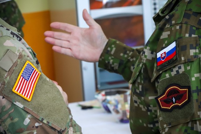 Soldiers from the 432nd Civil Affairs Battalion along with their counterparts in the Slovak military gifted ozone generators to a school in Martin, Slovakia, on February 12, 2021. Two-hundred and forty-five generators, supplied by a Slovak...