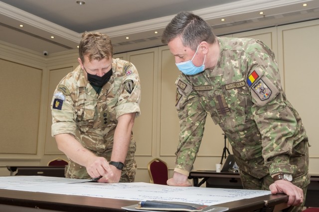 NATO officers from the Allied Rapid Reaction Corps and Multinational Corps Southeast discuss corps planning factors and operating concepts during a senior leader academics seminar in Bucharest, Romania, Jan. 22, 2021, as MNC-SE prepares for a...