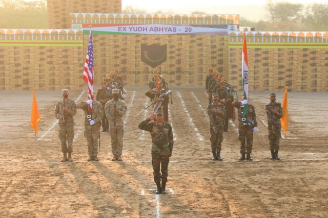 Soldiers of the Indian and U.S. armies mark the conclusion of Exercise Yudh Abhyas, Feb. 21, 2021 in India. Now in its 16th year, Yudh Abhyas builds on the enduring Indian-U.S. partnership through 14 days of combined field training, cultural exchange and a brigade-level command post exercise, leading to greater interoperability between the two nations, in support of a free and open Indo-Pacific. (Photo by Staff Sgt. Joe Tolliver, 1-2 Stryker Brigade Combat Team public affairs)
