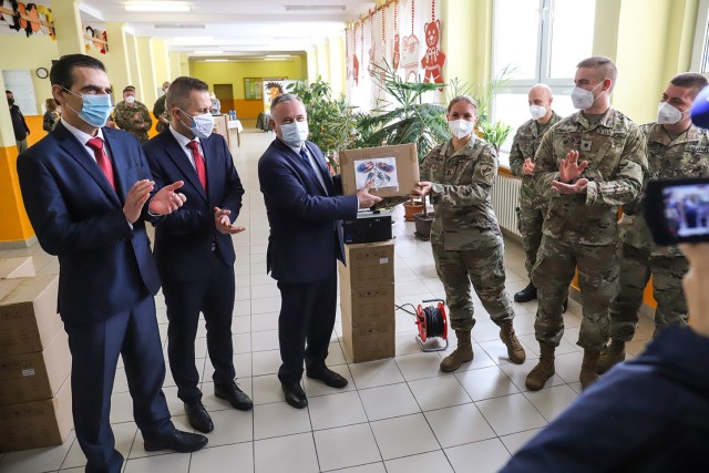 Soldiers from the 432nd Civil Affairs Battalion along with their counterparts in the Slovak military gifted ozone generators to a school in Martin, Slovakia, on February 12, 2021. Two-hundred and forty-five generators, supplied by a Slovak...
