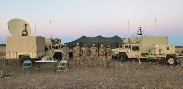 Soldiers with Bravo Company, 303rd Military Intelligence Battalion, 504th Expeditionary Military Intelligence Brigade utilize the TGS Lot E system in a field environment, December 2020. The system provide real time intelligence to commanders. (Courtesy photo)