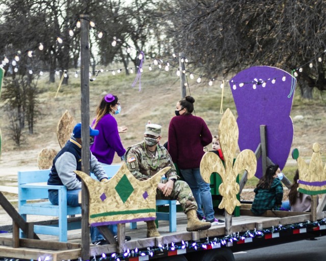 Placing first in the parade decorations contest was the Garrison HHC/Scout Troop 350 and Cub Scout Troop 350 float. Garrison Commander Col. Charles Bell is also on the float.