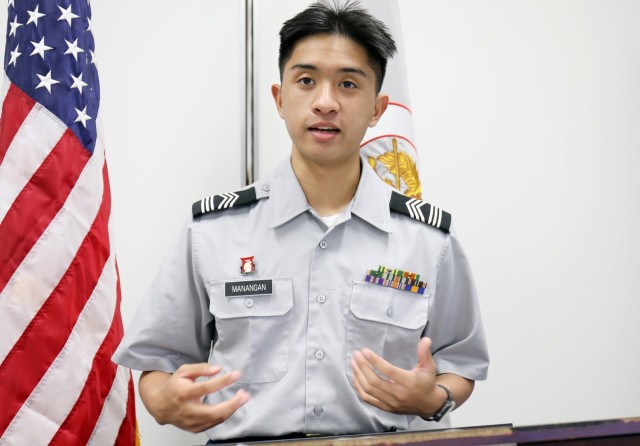 Cadet Master Sgt. Michael Manangan, a senior at Zama Middle High School and a member of the school’s U.S. Army Junior Reserve Officers’ Training Corps program, reads his essay on “The Challenges of Online and In-Person Learning in a Pandemic Environment” at the school, Camp Zama, Japan, Feb. 23. His essay came in third out of 106 annual JROTC essay contest entries from the 8th Brigade, U.S. Army Cadet Command, headquartered at Joint Base Lewis-McChord in Washington.