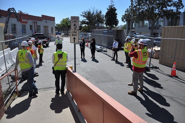 A team of state and federal representatives receive a pre-tour briefing from the U.S. Army Corps of Engineers of construction support at Beverly Hospital, Montebello, California, Feb. 23, 2021.