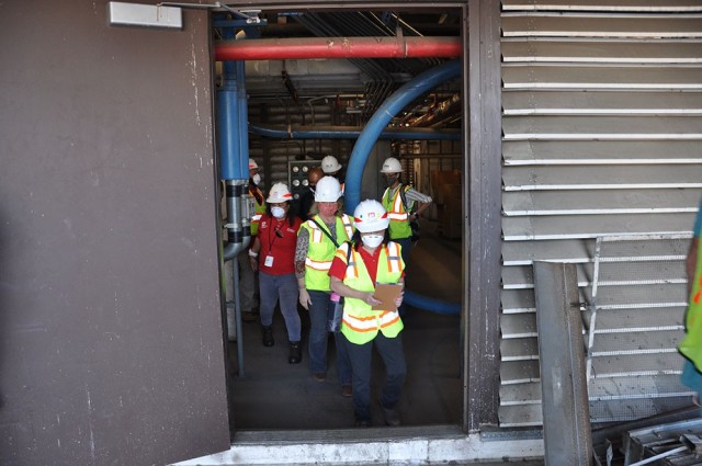 A team of state and federal representatives inspect construction progress by the U.S. Army Corps of Engineers at Beverly Hospital, Montebello, California, Feb. 23, 2021.