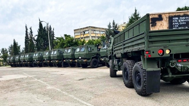 FMTV trucks stage at a Lebanese Armed Forces location in Beirut, Lebanon, after the Army Security Assistance Enterprise overcame pandemic restrictions, quality control and logistical challenges, to deliver ahead of schedule, 31 FMTV trucks to...