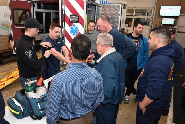 Cadet Damitz, far left, runs an instructional session on emergency medical treatment for personnel from the Western Salisbury Volunteer Fire Company, where he serves as the Medical Officer.