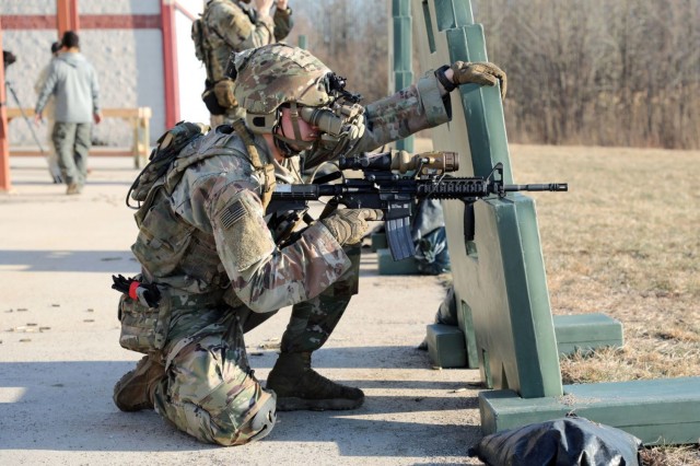 A Soldier from the 2-506, 101st Airborne Division don the Enhanced Night Vision Goggle (ENVG-B), Nett Warrior, and Family of Weapons Sight – Individual (FWS-I) during a live fire test event at a Soldier Touchpoint at Aberdeen Proving Ground, MD in February 2021.