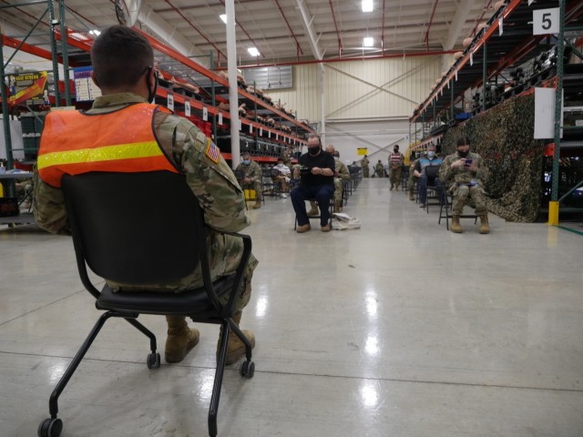 Military and civilian personnel wait the required 15-30 minutes after receiving their COVID-19 vaccination shot at the Fort Sam Houston COVID Vaccine Site, which is located in Building 4110, 2536 Garden Ave. The new location is currently taking...