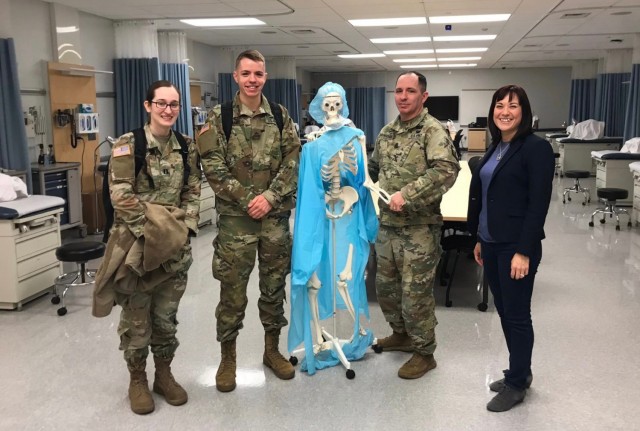 Cadet Damitz, 2nd Brigade Nurse Counselor CPTStorck, Steel Battalion MSG Brunhoeber, and DeSales University Division of Nursing-Marketing Liaison Laurie Stoudt hold a unified meeting, arranged to develop and strengthen relations between both organizations.