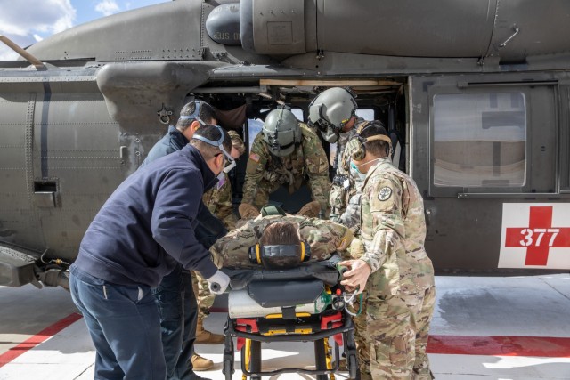 Lonestar Dustoff crews meet with medical personnel from William Beaumont Army Medical Center to discuss MEDEVAC operations at the new hospital’s helipad.