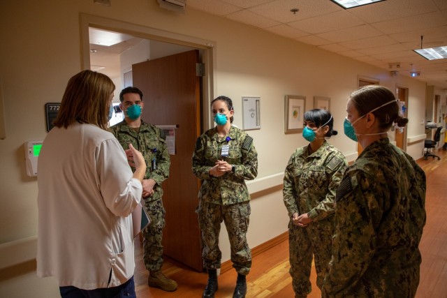 U.S. Navy Intensive Care Unit nurses, from the Naval Medical Center in San Diego, Calif., shadow their assigned nurse manager, Elisha Riggins, at Hendrick Medical Center in Abilene, Texas, Jan. 29, 2021.  The Navy medical personnel received orientation on their assigned floor and were introduced to their civilian counterparts during shadowing. U.S. Northern Command, through U.S. Army North, remains committed to providing flexible Department of Defense support to the whole-of-government COVID-19 response. (U.S. Army photo by Spc. Michael Ybarra, 5th Mobile Public Affairs Detachment)