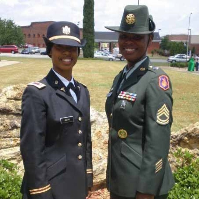 U.S. Army Reserve Sgt. Maj. Lynei Woodard (left), a Riverdale, Georgia native, poses for a photo when she was a young drill sergeant. Woodard, who joined the service at 17 years old is now the Operations Sergeant Major for the 98th Training...