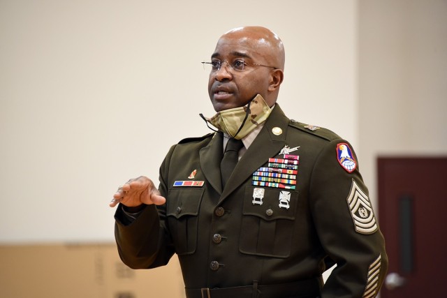 Command Sgt. Maj. Finis A. Dodson, command sergeant major, U.S. Army Space and Missile Defense Command, speaks to and visits with ROTC students from Alabama A&M University, Athens State University, and the University of Alabama-Huntsville at Alabama A&M University's Frank Lewis Gymnasium, Feb. 11.