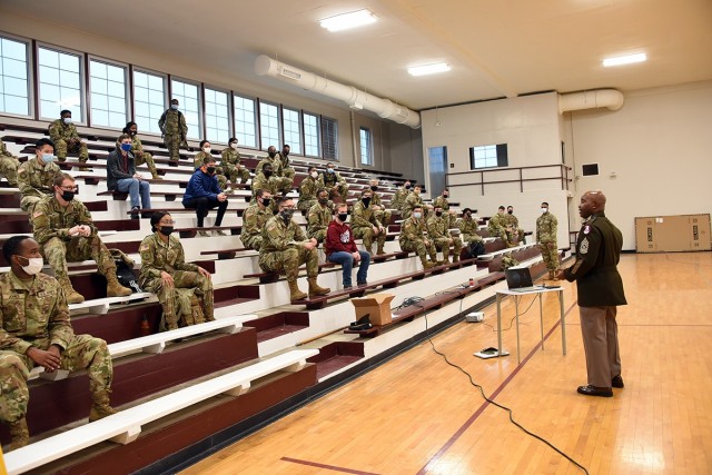 Command Sgt. Maj. Finis A. Dodson, command sergeant major, U.S. Army Space and Missile Defense Command, speaks to and visits with ROTC students from Alabama A&M University, Athens State University, and the University of Alabama-Huntsville at Alabama A&M University's Frank Lewis Gymnasium, Feb. 11.