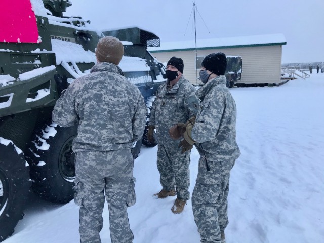 A medic from Role 1, 1st Stryker Brigade Combat Team, 25th Infantry Division, Master Sgt. David Edwards, ACM-AHS, and a medic from Role 1, 1/25 SBCT, conduct assessment training on an M1133 Stryker MEV (medical evacuation vehicle) in extreme cold weather at Fort Greely, Alaska,  February 6-12, 2021, in order to resolve Arctic Warfare gaps, enhance readiness, and inform modernization.