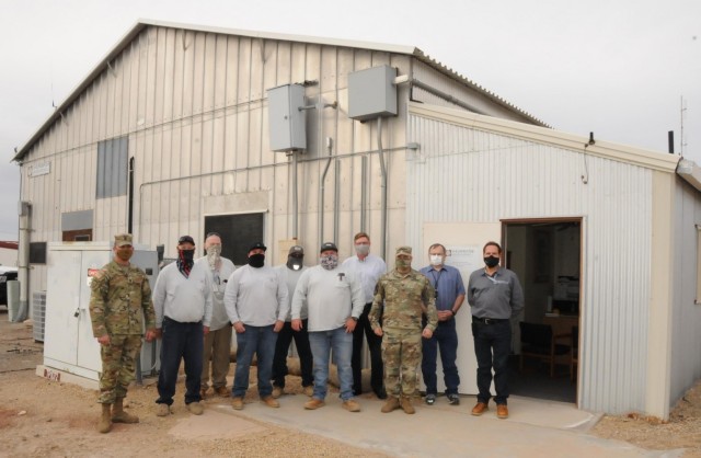 (Left to right) YPG Command Sgt. Maj. Herbert Gill, Shearwater’s power maintenance team: Mike Campbell, Rande Mayrant, David DuShane, Chuck Tawzer, John Redmon, Garrison Manager Ronny James, YPG Commander Col. Patrick McFall, Public Works...