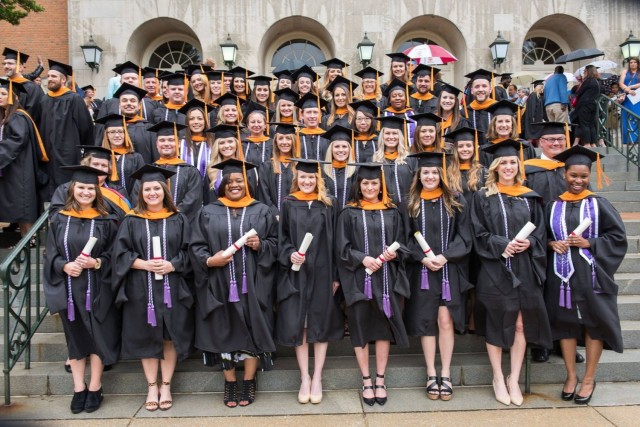 U.S. Army Reserve Sgt. Maj. Lynei Woodard (front, far right), a Riverdale, Georgia native, poses along with her master's degree classmates. Woodard, who joined the service at 17 years old is now the Operations Sergeant Major for the 98th Training...