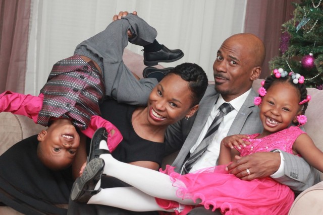 U.S. Army Reserve Sgt. Maj. Lynei Woodard, a Riverdale, Georgia native, attempts to take a family photo. Woodard, who joined the service at 17 years old is now the Operations Sergeant Major for the 98th Training Division (Initial Entry Training)...