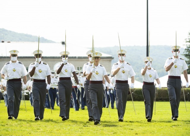 Cadet Reilly McGinnis, center, class of 2021 first captain, leads the Corps of Cadets during the pass in review portion of the Acceptance Day Parade Aug. 15, 2021. 