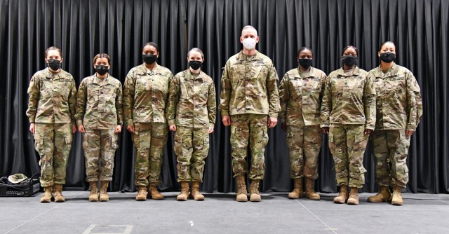 Maj. Gen. Dennis P. LeMaster, Commanding General MEDCoE (center), poses for a group photo with the Women’s History Month panel members (left to right) 2nd Lt. Cathryn Guzzwell, Capt. Amaya Vargas, Capt. Cotrena Brown-Johnson, Maj. Elizabeth Sebero, Drill Sgt. Sahara McCrary, Command Sgt. Maj. Deanna Carson, and 1st Sgt. Annie Thornton.