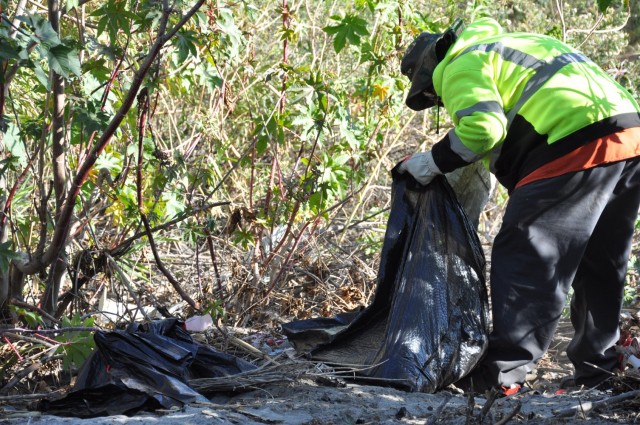 The U.S. Army Corps of Engineers Los Angeles District hauls debris left at a former homeless encampment, March 1, 2021.