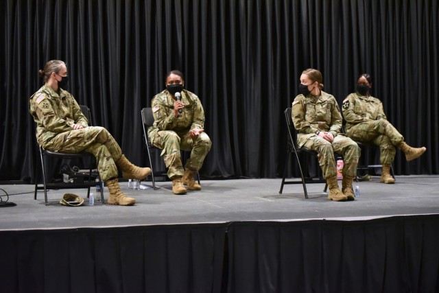 Capt. Cotrena Brown-Johnson, second from the left, answers a question during the Women’s History Month panel discussion.
