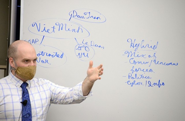 Command and General Staff College Civilian Educator of the Year Dr. Gates Brown, associate professor in the Department of Military History, CGSC, discusses hybrid warfare regarding the Vietnam War with his Command and General Staff Officer Course...