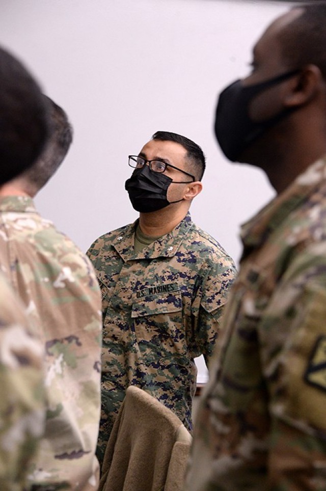 Marine Lt. Col. Tom Chhabra, assistant professor in the Department of Joint, Interagency and Multinational Operations, Command and General Staff College, observes student planning Feb. 19 at the Lewis and Clark Center. Chhabra has been named the...