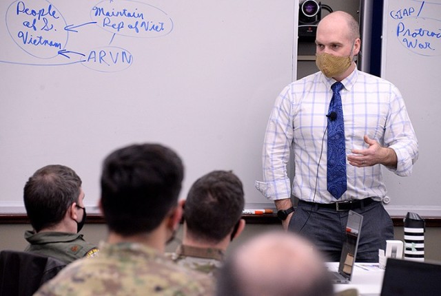Dr. Gates Brown, associate professor in the Department of Military History, Command and General Staff College, leads a discussion about Gen. William Westmoreland's operational approach in Vietnam and what the Viet Minh wanted during class with...