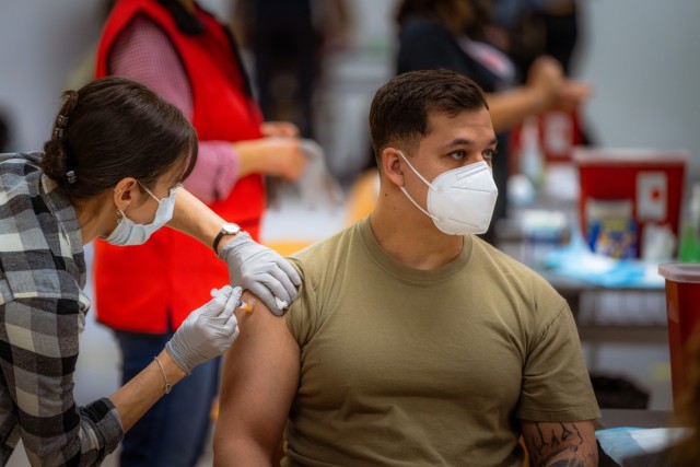 A U.S. Army Soldier from 1st Battalion, 214th Aviation Regiment, 12th Combat Aviation Brigade, receives his second and final COVID vaccine dose on Feb. 24, 2021, in Wiesbaden, Germany. (U.S. Army photo by Maj. Robert Fellingham)