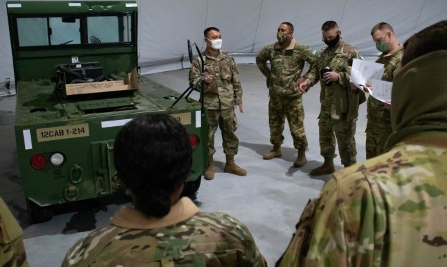 Aviation Soldiers assigned to Regional Command-East, Kosovo Force, listen to a safety course during an aviation stand down at Camp Bondsteel, Kosovo, on March 5, 2021. Aviation units across the U.S. Army conduct safety stand downs every year to focus on various safety procedures and to combat mid-tour complacency. (U.S. Army National Guard photo by Sgt. Jonathan Perdelwitz)