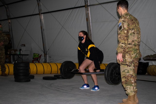 Spc. Lauren Smith and Maj. Daniel Diaz, aviation Soldiers assigned to Regional Command-East, Kosovo Force, teach an Army Combat Fitness Test safety course during an aviation stand down at Camp Bondsteel, Kosovo, on March 6, 2021. The stand down emphasized safety in all areas of Army skills, not just those that are aviation-specific. (U.S. Army National Guard photo by Sgt. Jonathan Perdelwitz)