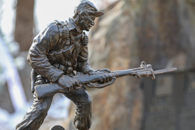 A statue of then-Capt. Lewis Millet that sits near the memorial site of the Battle of Hill 180 Feb. 5 at Osan Air Base. Seventy years ago, on Feb. 7, 1951, during the Operation Thunderbolt, the Soldiers of the 27th Infantry Regiment’s Company E...